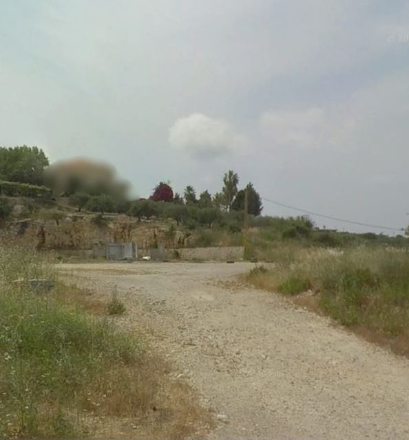 Land with a mountain view for sale in Kfarhata, Koura
