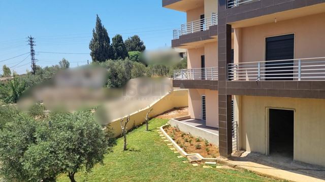 Apartment with a garden for sale in Fih, Koura