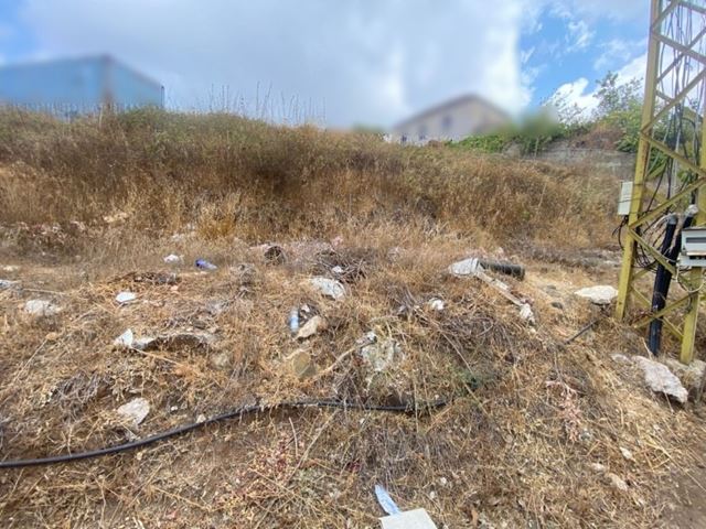 Land with a mountain view for sale in Kfarzebian, Keserwan